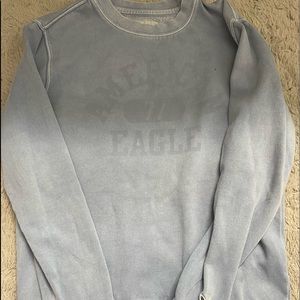 this is a blue american eagle crew neck